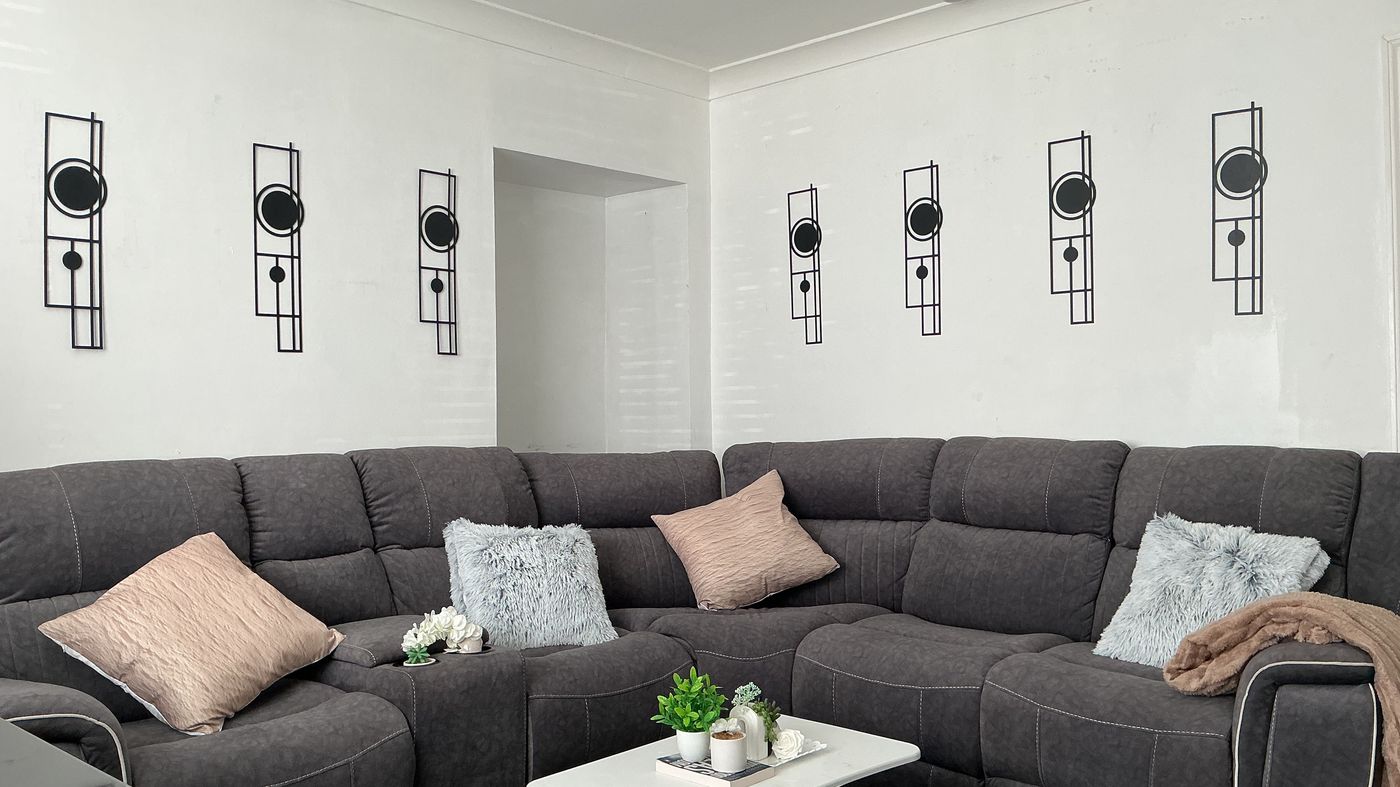 The finished room with wall panels and styling